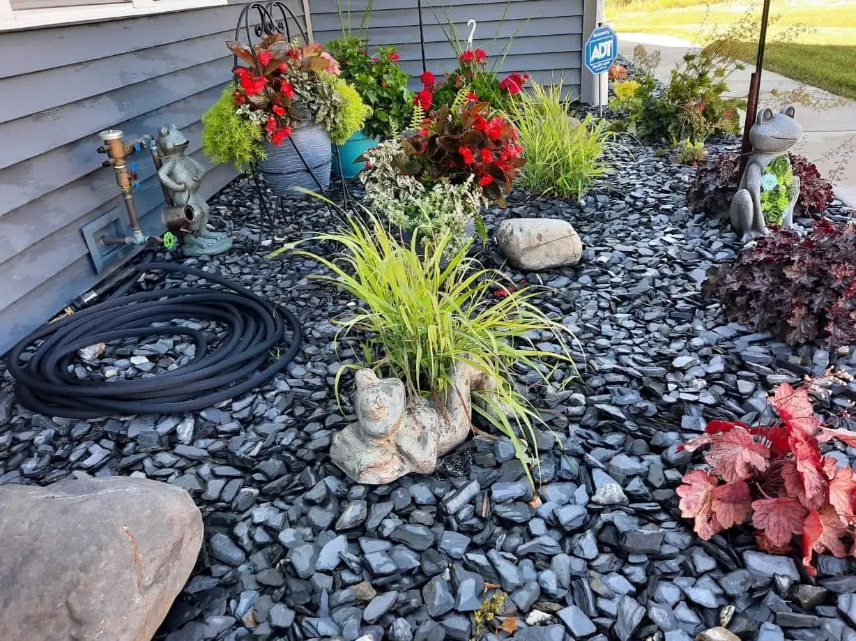 David's Lawn Care crew completing a landscaping project in Portage, IN